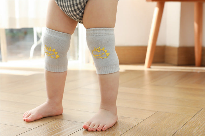 Genouilleres-animaux-bebe-crocodile-debout